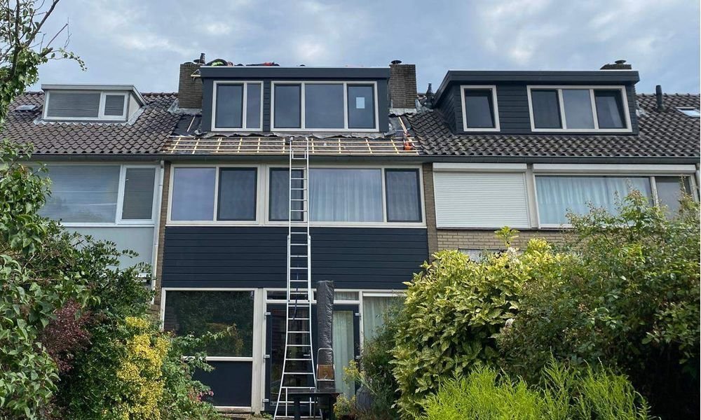 Wat kost een plat dak herstellen in Doorwerth?